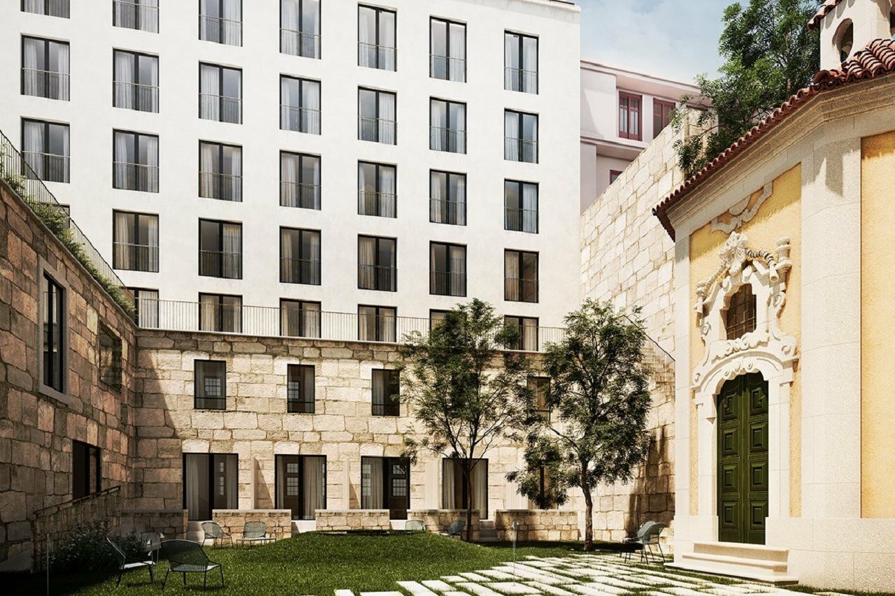 Portobay Flores Exteriér fotografie The courtyard of the new building
